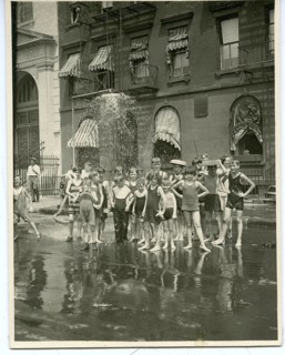 New York, SoHo, summer, hydrant, refreshment, water, group of children playing in water on a street