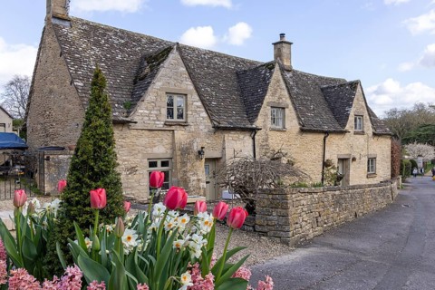 Houses, flowers, Cotswold Stone, Bibury, The Cotswolds, England, Great Britain
