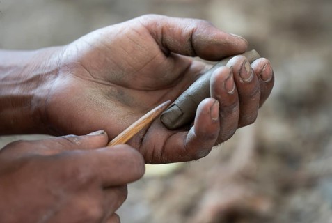 Artisan work on idols of the elephant-headed Hindu deity Ganesha at a workshop ahead of the Ganesh