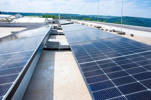 Close-up of solar cells on a roof under a clear sky, PV installation, Perrot company, Calw, Germany
