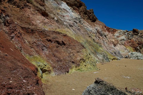 Versatile play of colors in the geological structure with dominant earth tones, Paliochori beach,