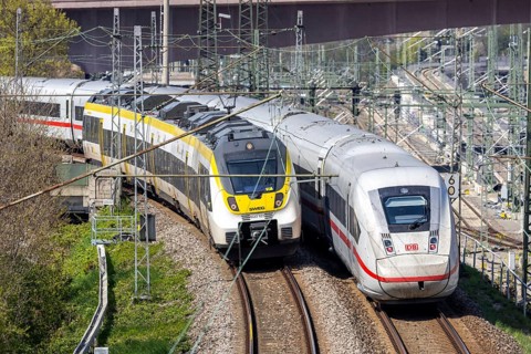 Regional train and ICE 4 high-speed train of Deutsche Bahn DB in Stuttgart Untertürkheim, Germany