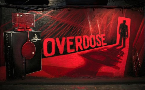 Overdose, legal, temporary graffiti in the Graffiti Tunnel, Leake Street Arches, London, England,