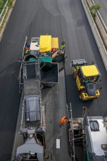 Essen, North Rhine-Westphalia, Germany, Road construction, Asphalt pavers and road rollers lay new,