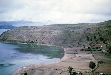 Landscape view of agriculture and houses on the shore of Lake Titicaca, Strait of Tiquina, Bolivia,