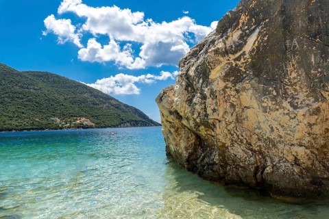 Beach in summer of Paralia Mikros Gialos in the south of the island of Lefkada. Greece
