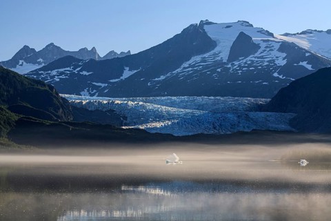 Glacier tongue and glacial lake in front of steep mountains, Mendenhall Glacier, Juneau, Southeast