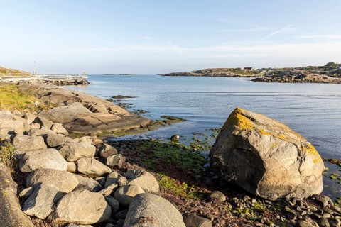 Small bay with swimming area in the North Sea, typical rocks on the west coast with archipelago,