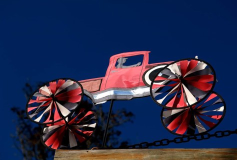 Pickup truck as windmill of a car repair shop against blue sky, Marksboro, New Jersey, USA