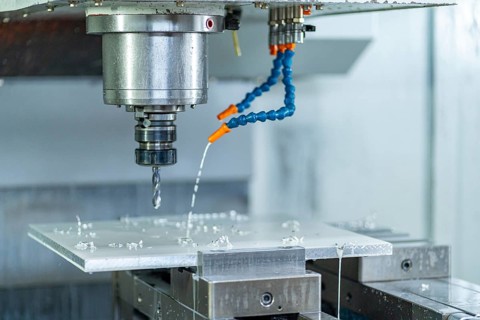 The CNC milling machine cutting the mould parts with ball end-mill tool