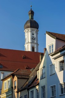 Bell tower, parish church of the Assumption of the Virgin Mary, row of houses, gable of the old
