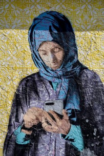 Mural of a veiled woman with a mobile phone, graffito, Al Khobar, ash-Sharqiyya province, Persian