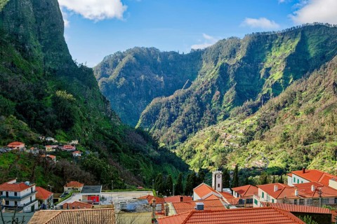 Curral das Freiras surrounded by mountains, parish of the district of Câmara de Lobos, tourist