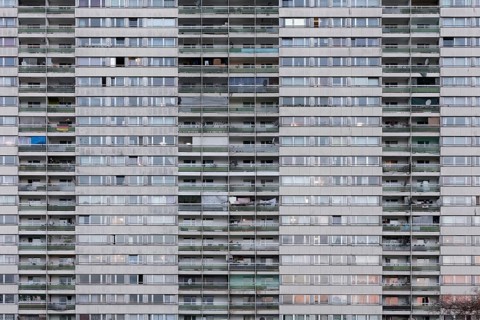 Dreary tower block from the 1970s in the Hochheide residential park, run-down property with