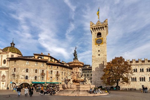 Piazza del Duomo with Palazzo Pretorio and the Neptune Fountain Trento, Trentino, Italy