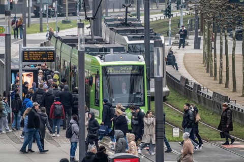 Full tram stop Schadowstraße, rainy weather, Düsseldorf, North Rhine-Westphalia, Germany
