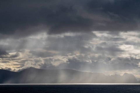 Rain showers over the Norwegian Sea, Söröya, Finnmark, Norway, September 2018