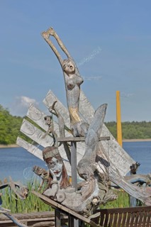 Sculpture by Tony Torrilhon 2008, floating laughing, cheerful naked mermaids, modern art, wood