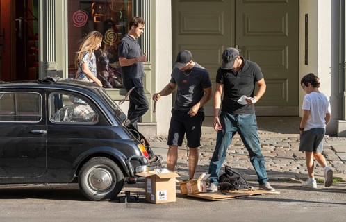 Two men repair the engine of a Fiat 500, Neue Schönholzer Strasse, Berlin, Germany