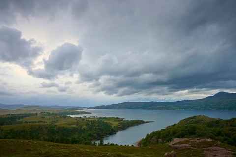 Extensive landscape with a lake under a cloudy sky, Loch Torridon, Kenmore, Strathcarron, Scotland,