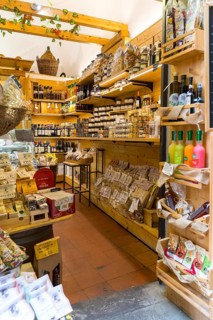 Grocery shop with a wide range of products in the historic centre of Volterra, province of Pisa,