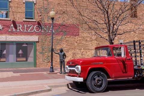 Statue of a man Standin' on a Corner in Winslow Arizona as sung in the classic Glenn Frey and