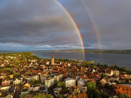 Aerial view of the historic old town of Radolfzell am Lake Constance with the cathedral illuminated