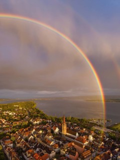 Aerial view of the historic old town of Radolfzell am Lake Constance with the cathedral illuminated