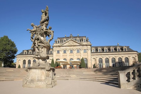 Orangery and Floravase, stone sculptures with decorations, outdoor staircase in the castle park,