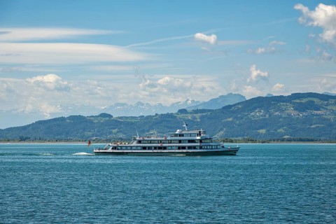 Large passenger ship, excursion ship, MS Münschen der Weißen Flotte sails on the blue Lake