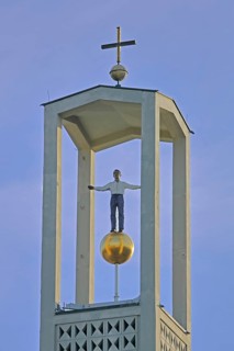 Tower of St Elisabeth's Church with cross and sculpture by Stephan Balkenhol 2012, documenta 13,