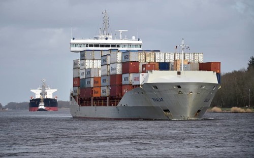 Container ship SKALAR sails in front of freighter ULTRA LANIN in the Kiel Canal, NOK, Kiel Canal,