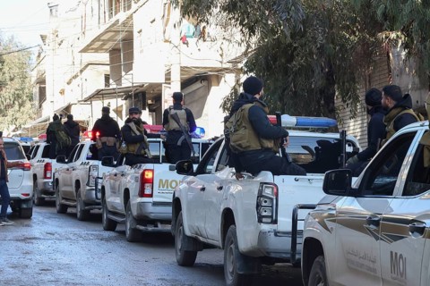 In Aleppo, Syria on January 10, 2026, Syrian Army soldiers deploy throughout the Sheikh Maqsoud and