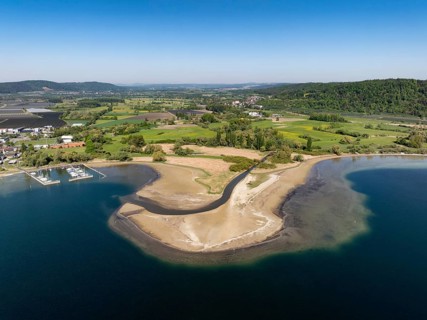 Aerial view of the mouth of the Stockacher Aach at low water, which flows into Lake Überlingen. The