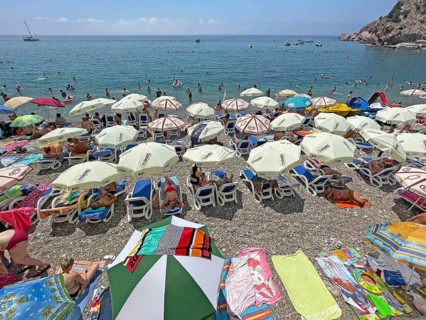 Bathing beach, pebble beach, umbrellas, crowded, holiday, summer holiday, resort, Mediterranean,