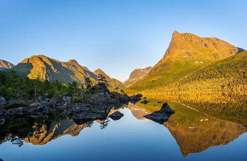 Picturesque mountain landscape with Innerdalstårnet peak in the Innerdalen high valley, mountain