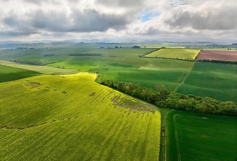 Drone photo of agricultural fields with blooming rape seed at the sottish border near Oxnam,