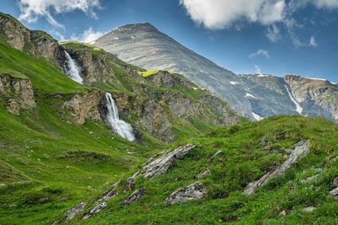 Waterfall and mountain meadows at Nassfeld, Heiligenblut, Carinthia, Austria