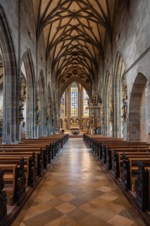 Interior, central nave of the Holy Cross Münster with the complex mesh and star rib vault, which