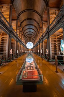 Library room with exhibited globe and old book collection, Trinity Collage, Dublin, Ireland