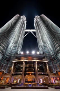 Petronas Towers, KLCC Twin Towers, interlinked 88-storey supertall twin skyscrapers illuminated at