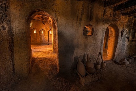 Interior of an old historic casbah with old clay jugs, kasbah, clay castle, tighremt, Berber