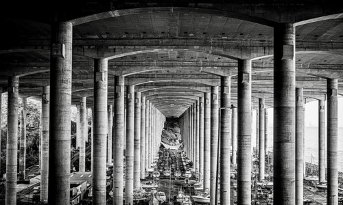 Supports under the runway of Funchal airport, black in Madeira, Portugal