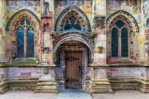Used as a film set for The Da Vinci Code, a carved Gothic doorway and tracery windows form the