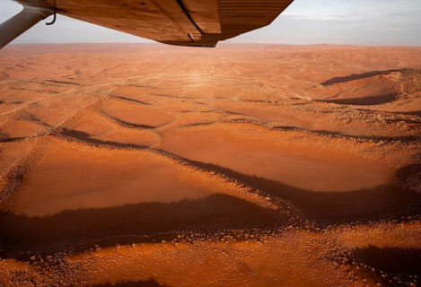 Aerial view from the plane, red sand dunes of the Namib Desert, Namib Naukluft Park, Namibia