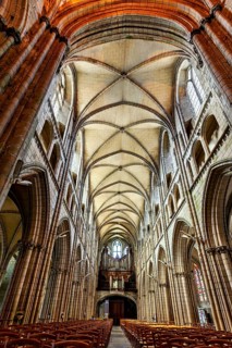 Gothic church interior with high vaults and incoming light, Saint-Paul-Aurélien Cathedral in