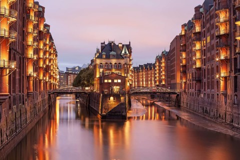 11.6.2018: Twilight view of the Wasserschloss (Water Castle) in the historic Speicherstadt district