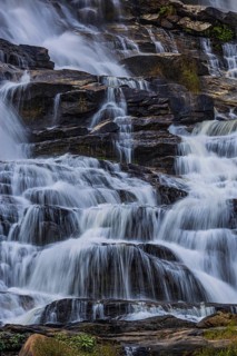 Mae Ya waterfall with cascading flowing water, near Doi Inthanon National Park, Chiang Mai