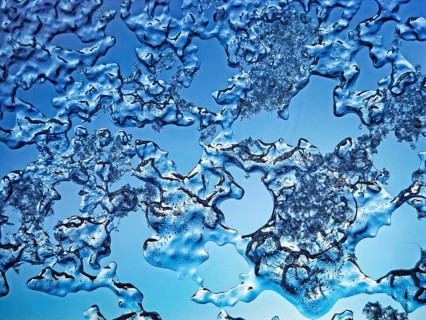 Abstract texture, close-up of ice crystals and frost structures on a glass pane, frozen skylight in