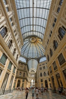 Galleria Umberto I with passers-by, historic shopping arcade with glass roofs and dome, Naples,